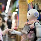 A girl with a robot
